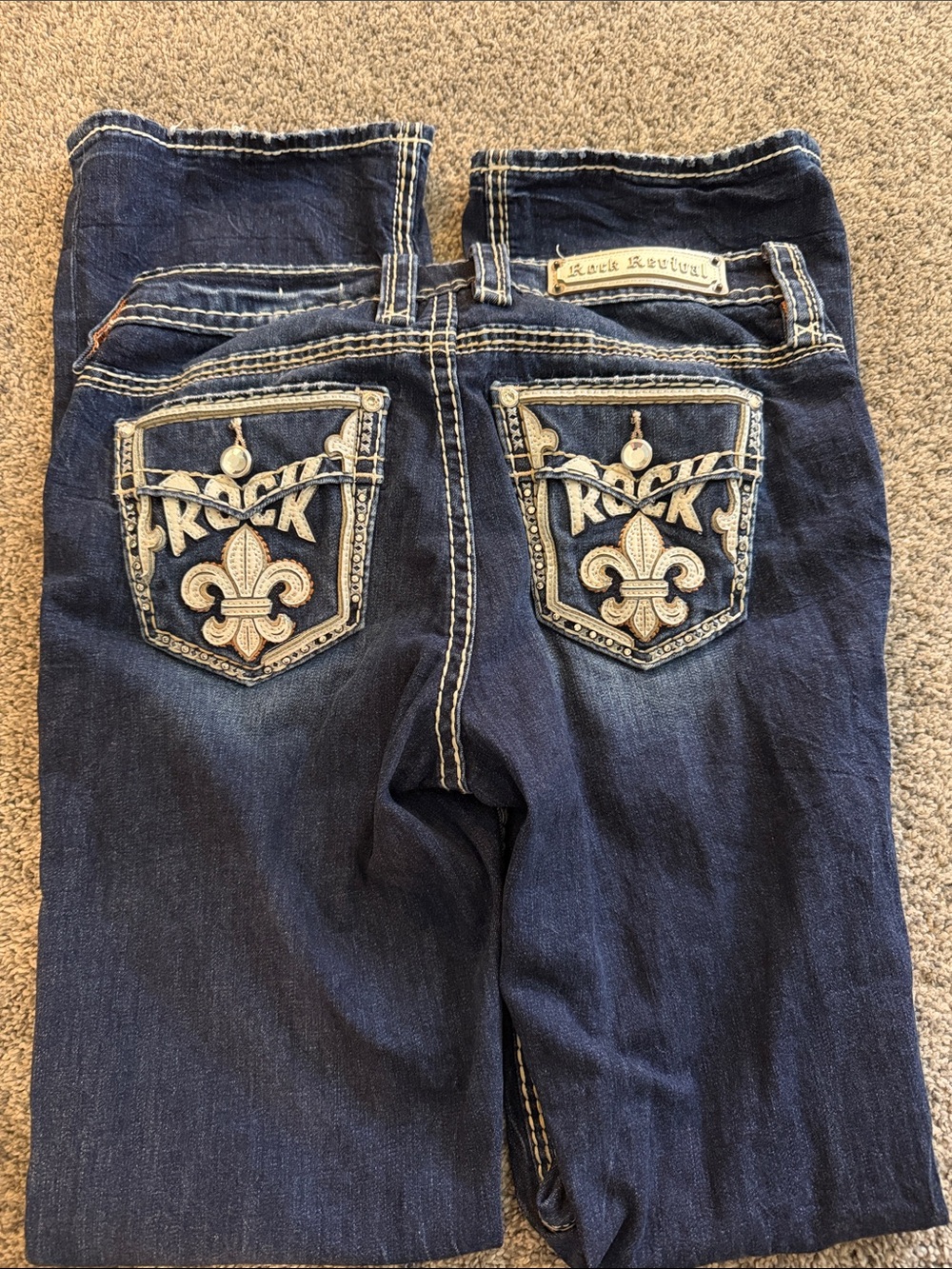 Rock Revival Dark Blue Jeans with Embroidered Fleur-de-Lis Pockets